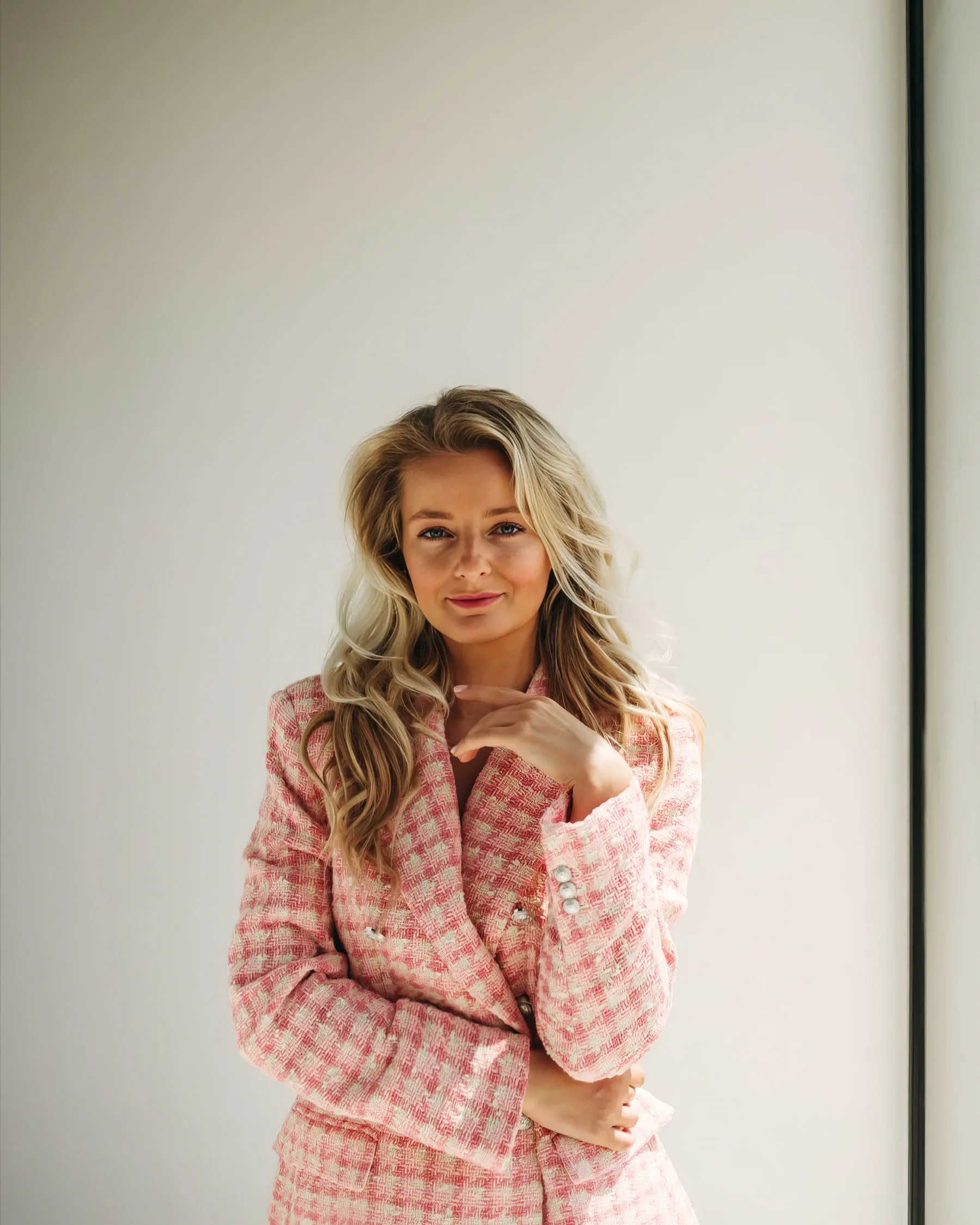 Veronika Bogarova Matta in a blush tweed blazer, studio portrait
